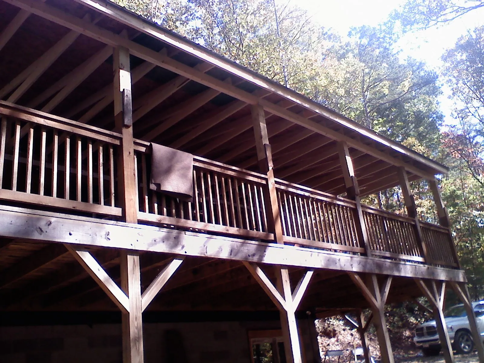 Timber framing under a new elevated porch and deck — Roof Leak Repair in Battle Creek by Roofing Brothers